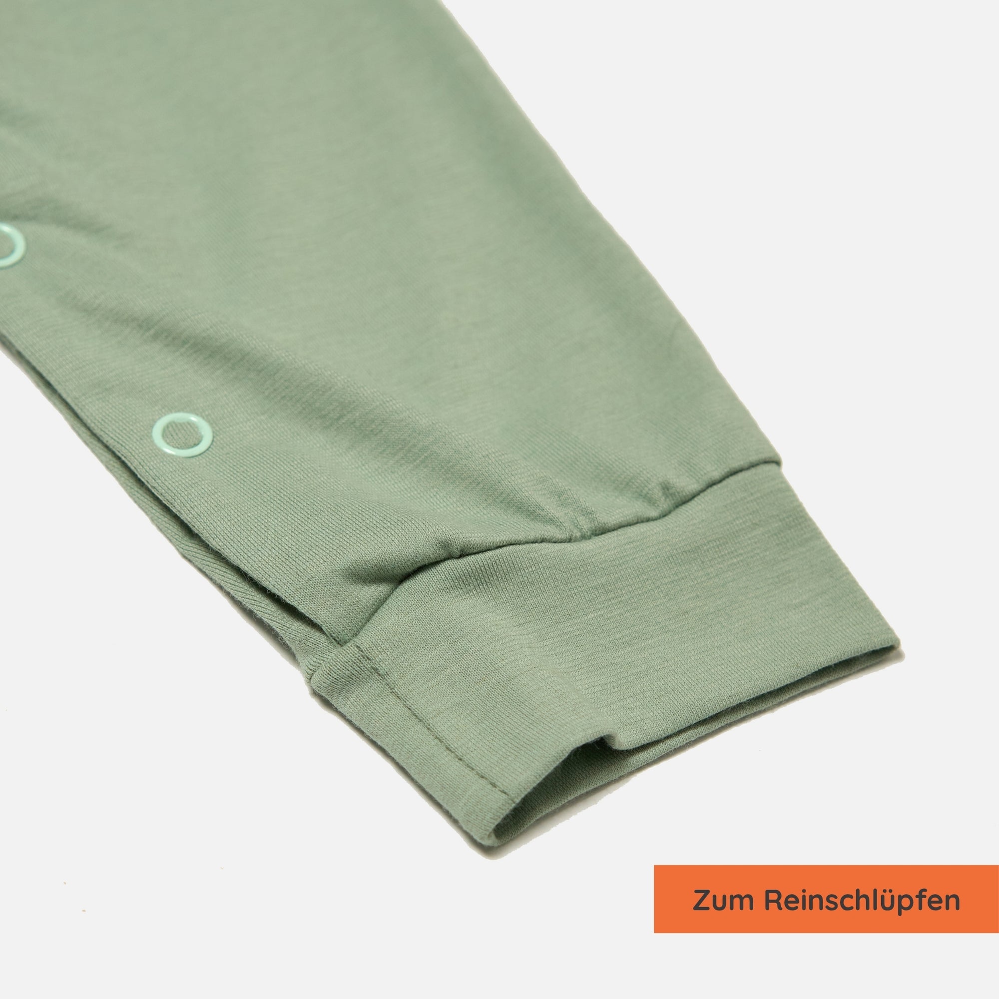 Detailansicht Saum am Bein: Einteiler für Babys mit UPF50+ als UV-Schutz Kleidung für Kinder.