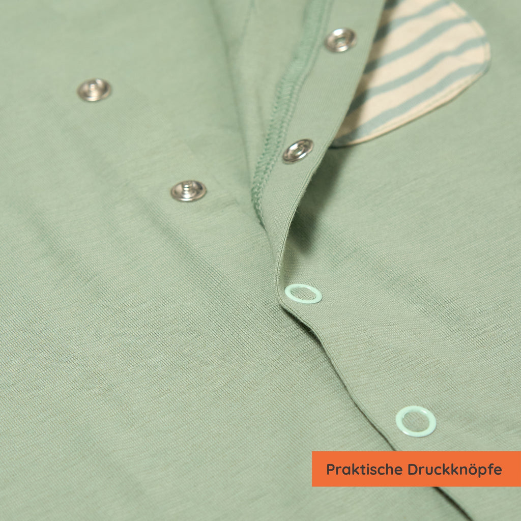 Detailansicht Druckknöpfe: Einteiler für Babys mit UPF50+ als UV-Schutz Kleidung für Kinder.